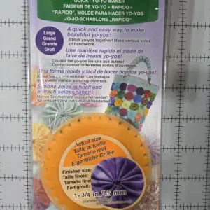 Paper folding circle for crafting decorative paper flowers.