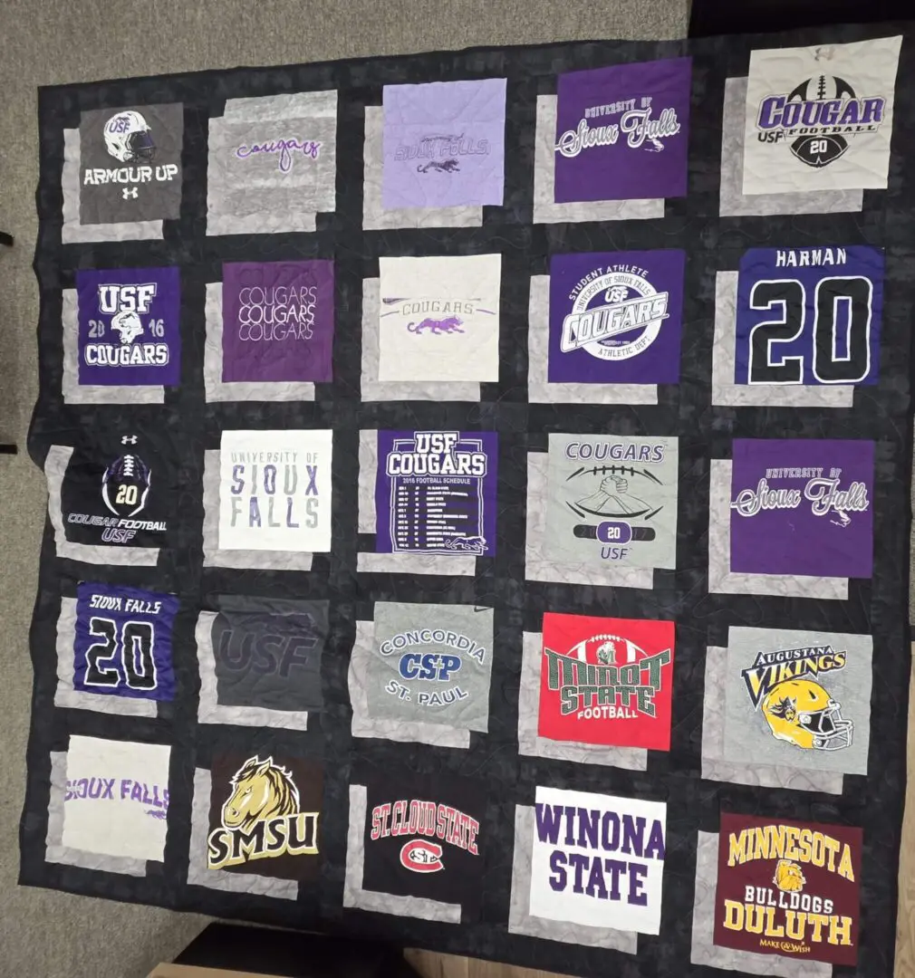 Quilt made of college sports t-shirts.