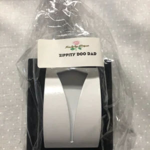 Packaged white dog waste bags dispenser with roll inside.
